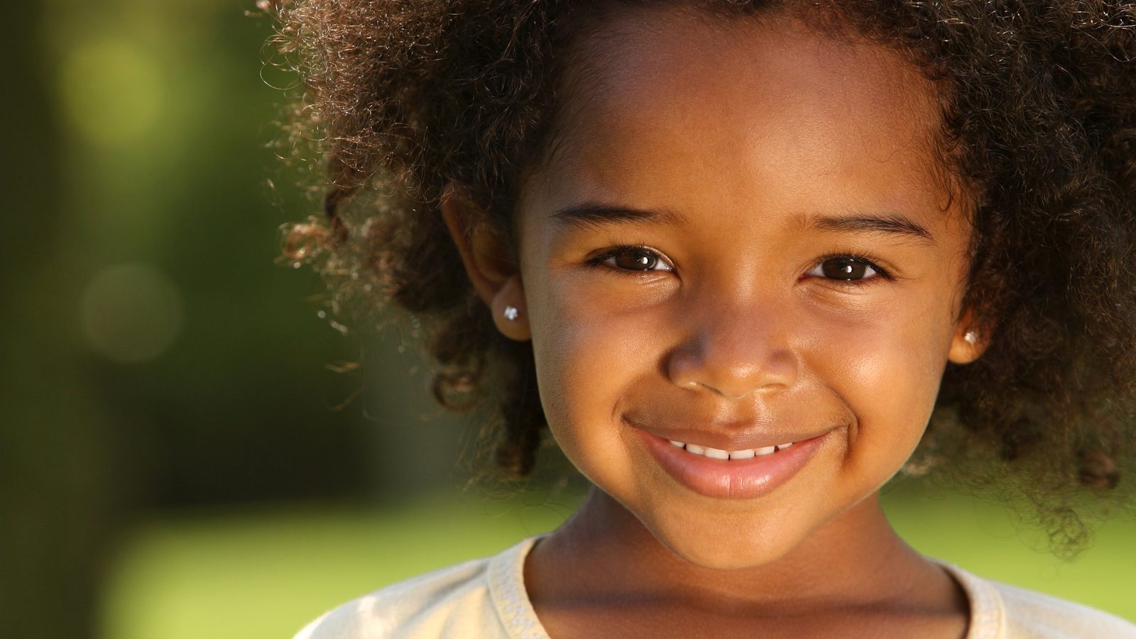 Smiling girl outdoors