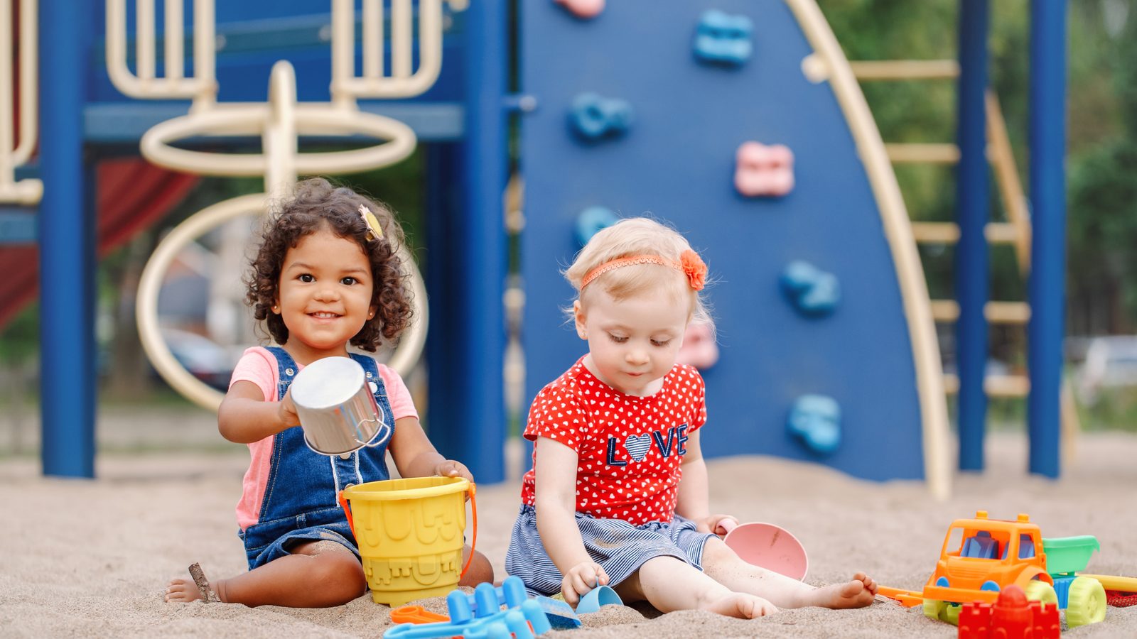 Children playing on a playground slide