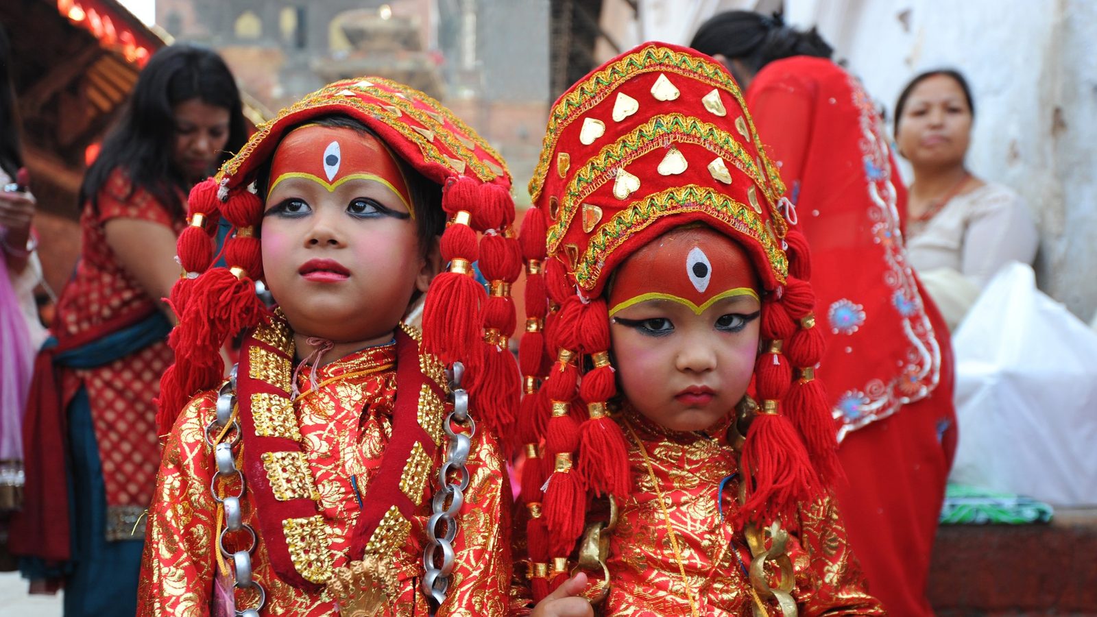 Young children in traditional festival dress