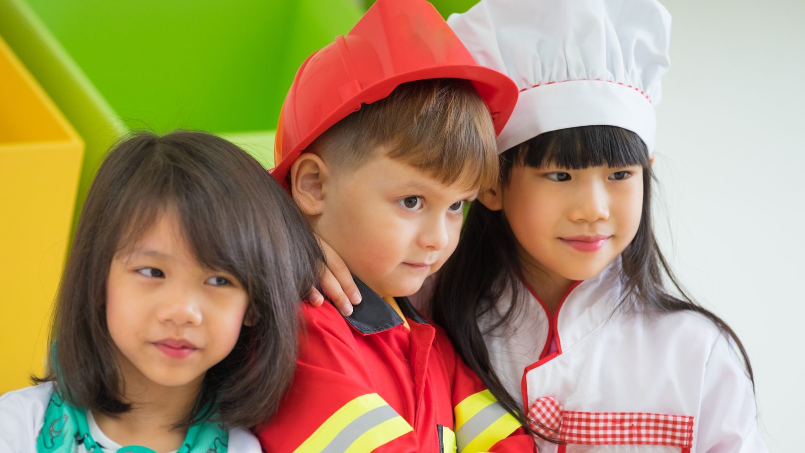Children dressed up as firefighters for pretend play