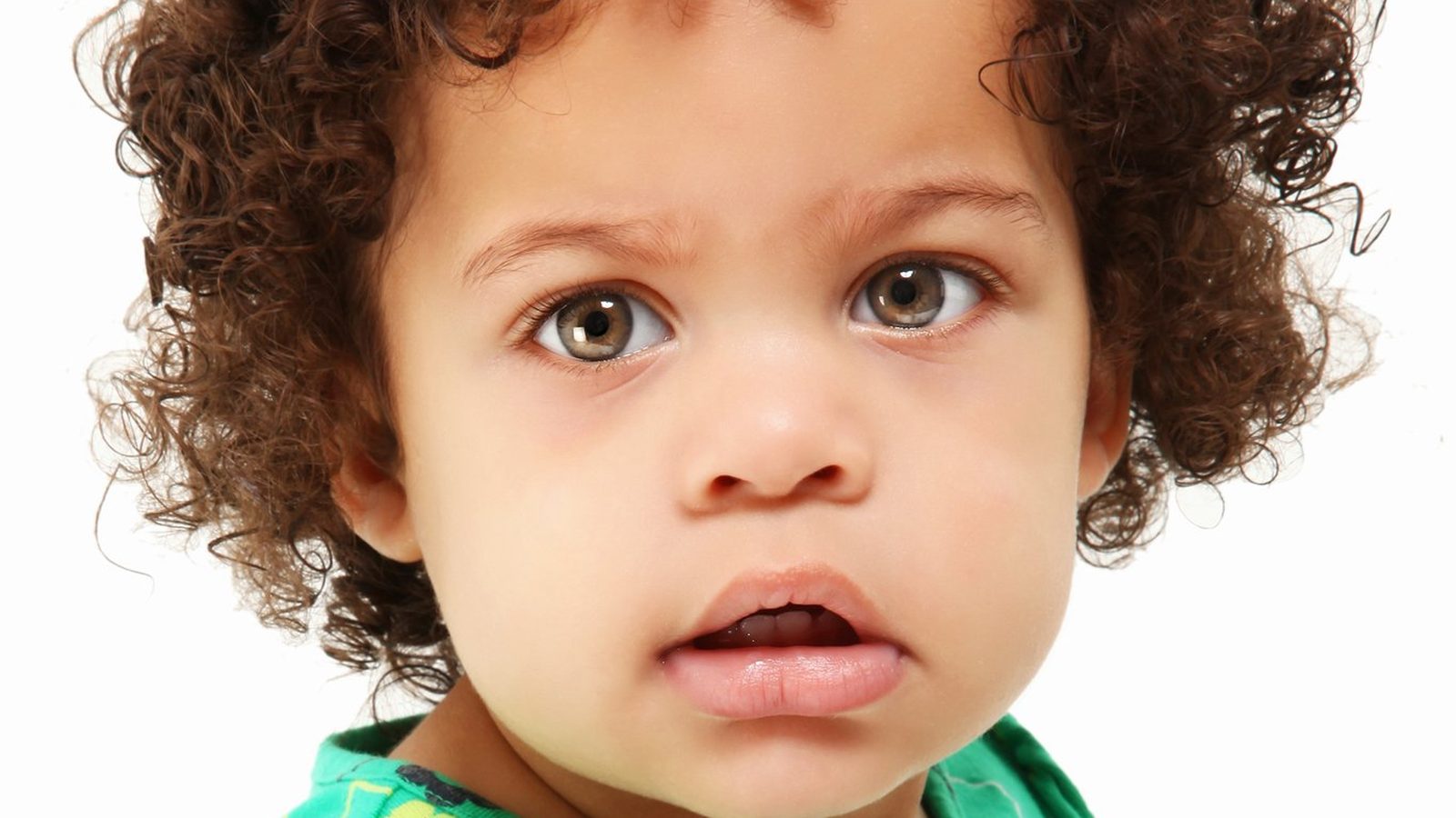 Curly-haired girl smiling