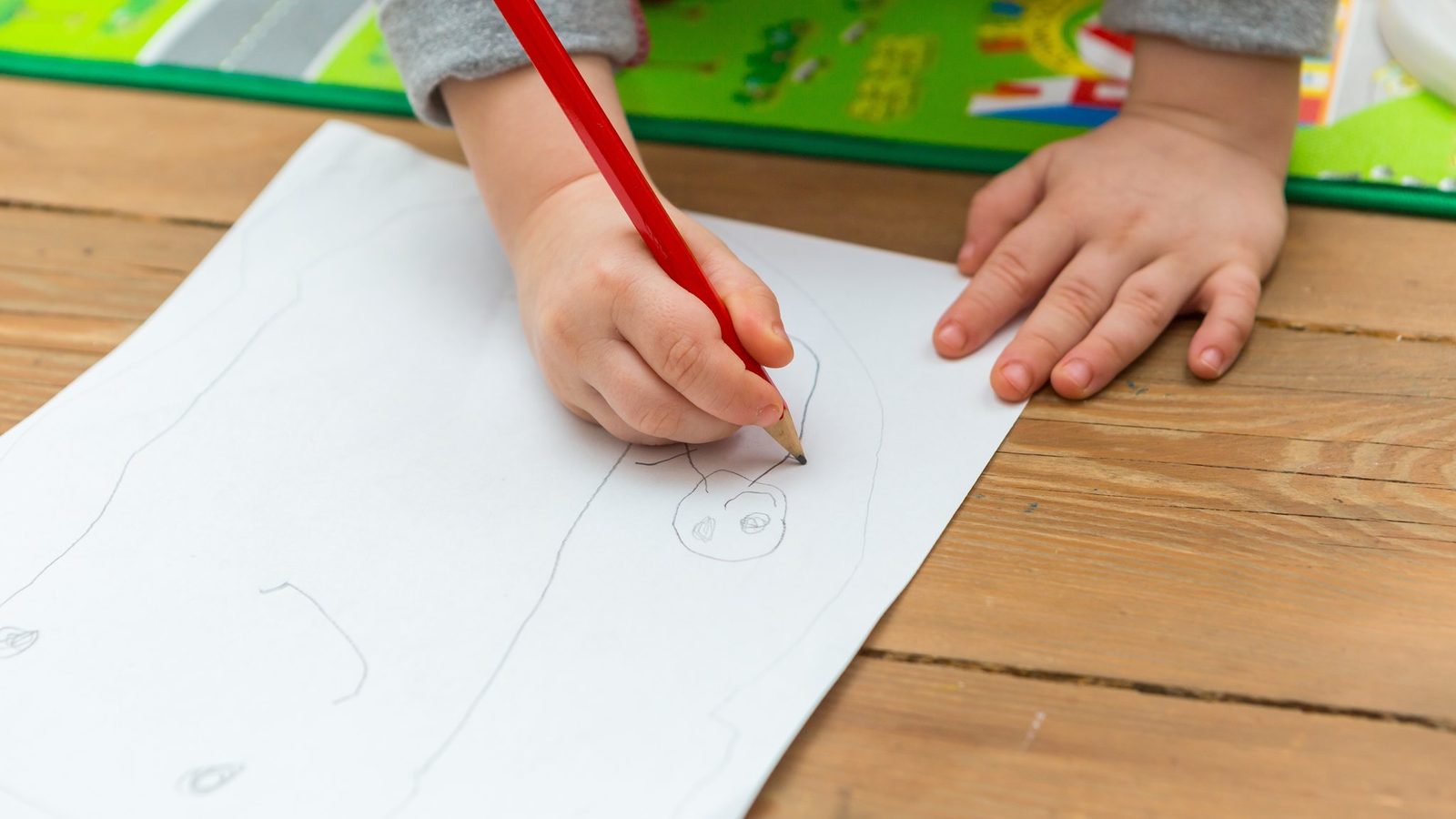 Hand drawing with a red pencil