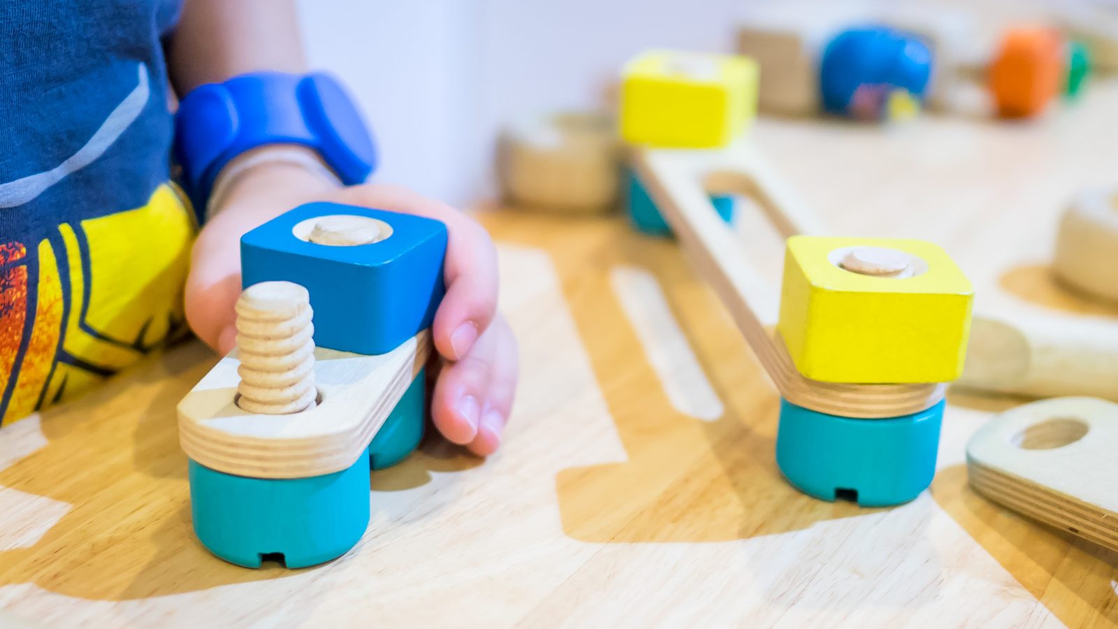 Wooden building toys on a floor